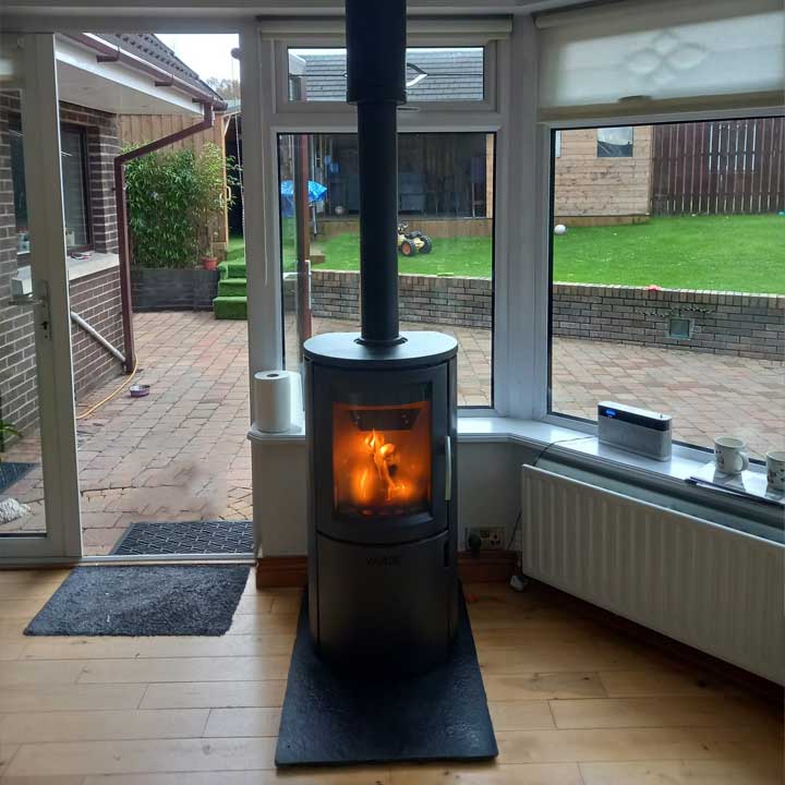 Roaring Fireplaces Installations stove in conservatory